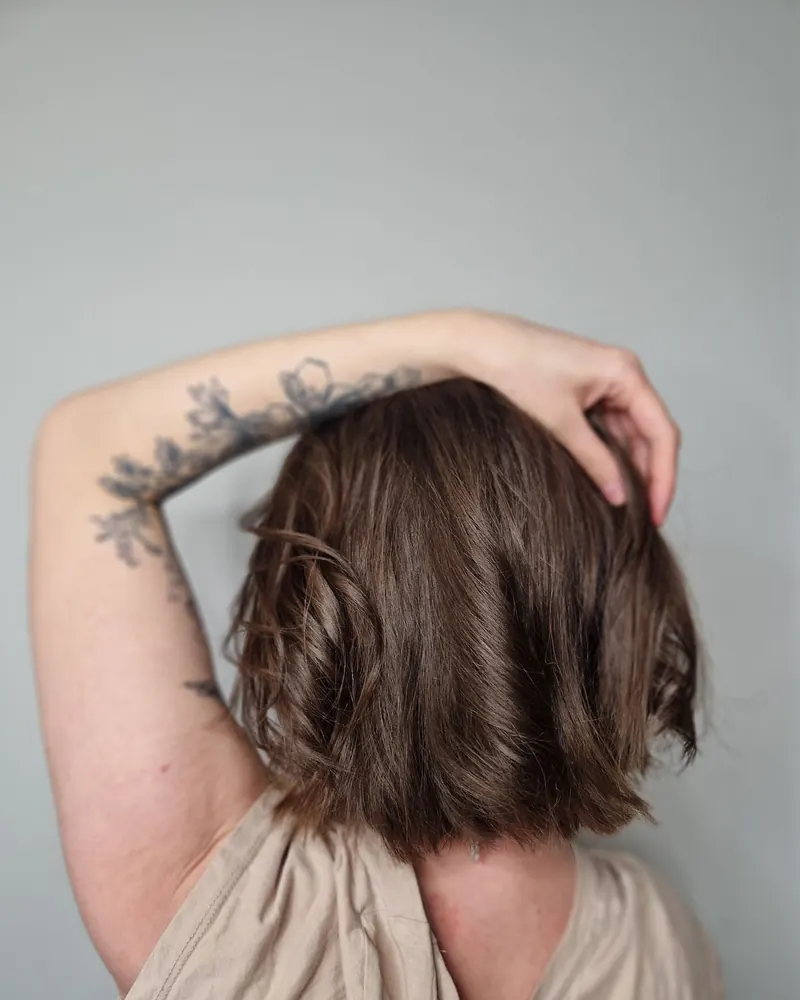 Chin-length brunette bob from behind