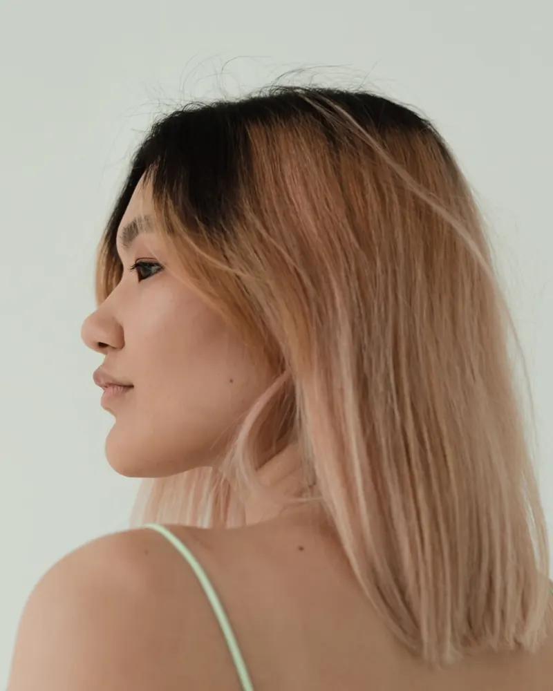 Shoulder-length hair with a soft rooted ombre