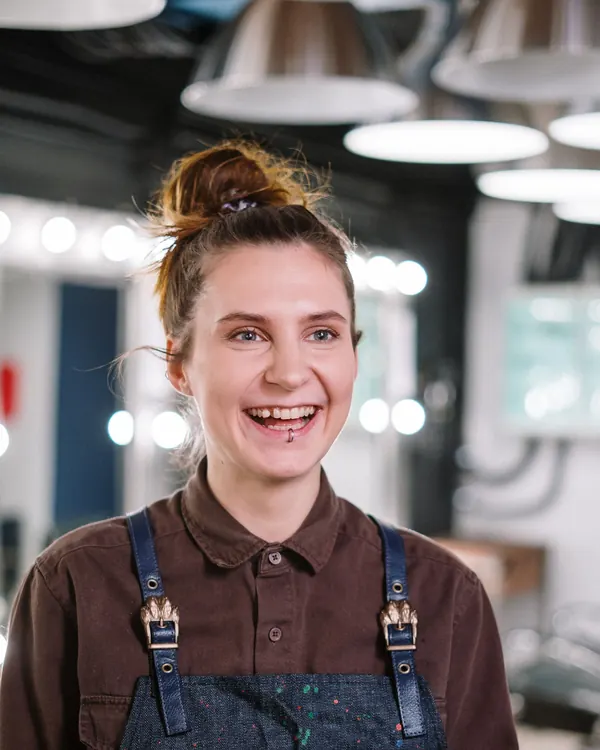 Tessa Marin smiling in her studio apron